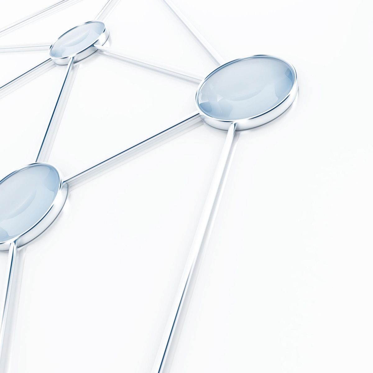 Glass nodes linked by thin rods on a white background
